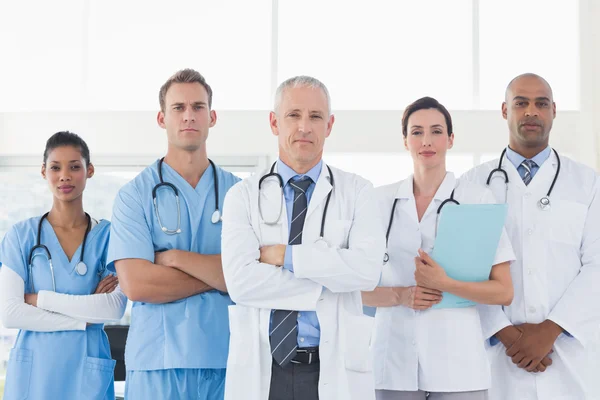 depositphotos_76211603-stock-photo-team-of-smiling-doctors